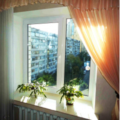 Металопластикові вікна Рехау із плівкою на склі, протиударні вікна Київ