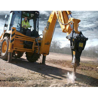 Ломка здания гидромолотом CAT H70