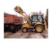 Уборка снега экскаватором-погрузчиком Caterpillar 428F