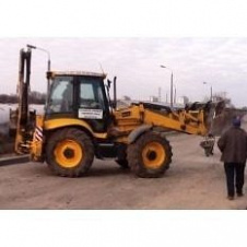 Планування землі екскаватором-навантажувачем JCB 4cx