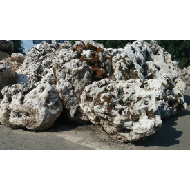 Камень известняк дырчатый насыпом серый