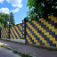 Блок декоративний рваний камінь з фаскою для забору 390х90х190 мм жовтий Київ