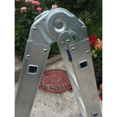 Чотирьохсекційна шарнірна драбина трансформер 2 x 4 + 2 x 5 сходинки Техпром Самбір