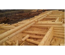 Строительство деревянного коттеджа из дикого бруса