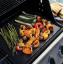 Тефлоновый коврик для гриля No Brand BBQ grill sheet с антипригарным покрытием 33x40 см Черный (2104618536) Нововолинськ