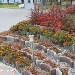 Квітник круглий Золотий Мандарин 660х450х250 мм на сірому цементі коричневий Київ