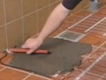 Установка тонкої теплої підлоги DEVI на тонких нагрівальних матах