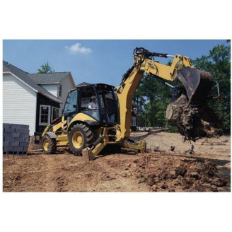 Выкорчевывание пней экскаватором-погрузчиком Caterpillar 428F