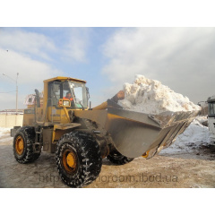 Уборка снега погрузчиком Киев