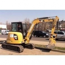 Викорчовування пнів міні-екскаватором Caterpillar 305