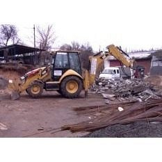 Демонтаж асфальтного покриття гідромолотом CAT H70 Київ
