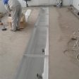 Нанесення першого шару гідроізоляції по поверхні бетону