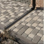 Тротуарна плитка Золотий Мандарин Старе місто 120х40 мм на сірому цементі чорний Хмельницький