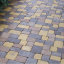 Тротуарна плитка Золотий Мандарин Плац Антик 160х60 мм на сірому цементі коричневий Чернівці