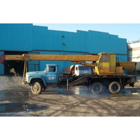 Завантаження верстатів краном маніпулятором