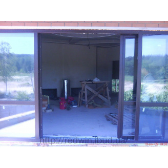 Розсувні алюмінієві двері Алюрон (Польща) до будинку