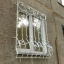 Решітка на вікна з кованими елементами для будівництва Legran Київ