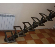 Виготовлення металокаркасу сходів із чорного металу труба 100х100