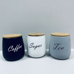 Набір керамічних банок з бамбуковими кришками BonaDi 304-034 Sugar/Tea/Coffee 3 шт 11,5х11,5х13 см 1 л Різнокольоровий (23523) Черкаси