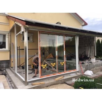 Раздвижная алюминиевая дверь Profilco (Греция) с монтажом от завода в Киеве