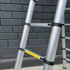 Телескопічна двосекційна драбина 2 х 10 сходинок Техпром Цумань