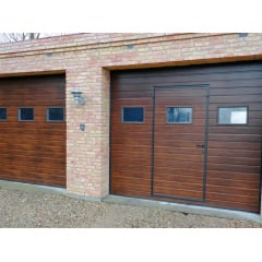 Промышленные гаражные ворота Gant Plus Pro - панель Широкая линия, размер 2500x2100 мм., цвет Темный дуб. Ручное управление. Киев
