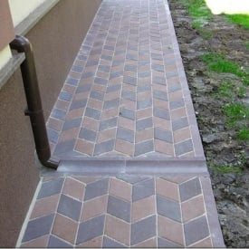 Отлив Золотой Мандарин 500х200х60 мм на сером цементе коричневый