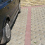 Тротуарна плитка Золотий Мандарин решітка Паркувальна 500х500х80 мм на сірому цементі гірчичний Київ