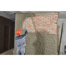 Штукатуркa стін у котеджі