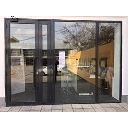 Розсувні алюмінієві двері Алюрон (Польща) із замком для дому