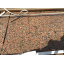 Плитка на фасад будинку з коричневого граніту Жадківка на замовлення Костопіль