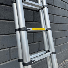 Телескопічна двосекційна драбина 2 х 10 сходинок Техпром Цумань