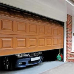 Секційні гаражні ворота Gant Plus - панель Фільонка, розмір 2700x2300 мм., колір Золотий дуб. Ручне управління. Київ